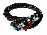 Armreif  mit Kunststoffperlen